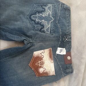 Antik denim woman’s Distressed Blue Jeans with Embroidered Back Pockets